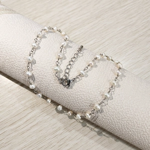 Close-up of 3mm freshwater pearls and silver chain with lobster clasp and extender