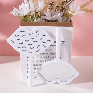 Lip shaped handheld makeup mirrors with eyelash pattern and white plastic handle
