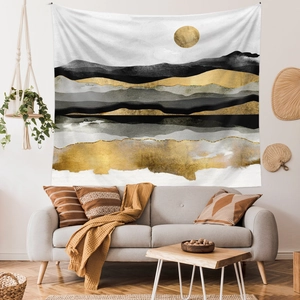 Detail showing the abstract mountain tapestry texture and fine golden print finish
