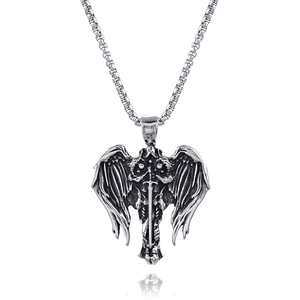 Detailed view of vintage gothic silver sword pendant with intricate double wings and chain