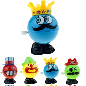 Mechanical wind-up ball toys featuring various colorful crown and hat character designs