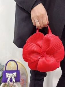 Creative red flower petal tote bag with lifelike textures and beaded stamen details