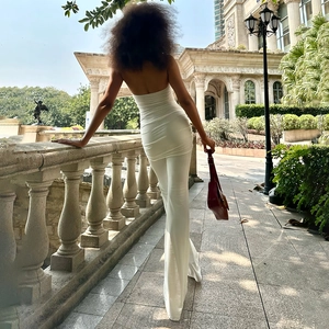 Slim fit white sleeveless backless bodysuit for women shown from a stylish back view angle