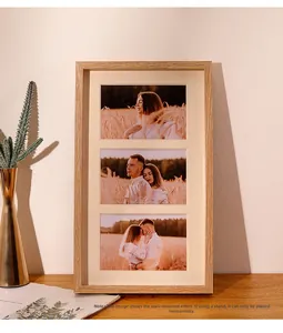 Close-up of three-aperture oak wood photo frame with matte finish and scenery setup