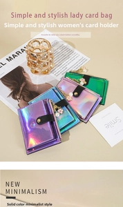 Detail of slim holographic card holders in multiple colors with pearl flower charms