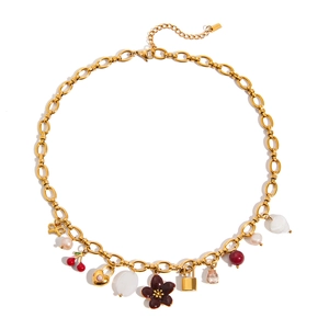 Gold stainless steel necklace with cherry, heart lock, and pearl charms on white background