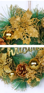 Detail of Christmas wreath with golden berries, pine cones and Merry Christmas lettering