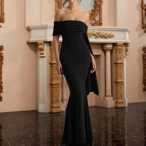 Elegant off-shoulder black slim-fit evening gown with trailing mermaid hem and sleek design