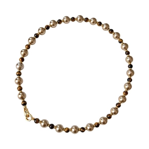 Collier plaqué or avec alternance de perles d'œil de tigre brunes et perles rondes