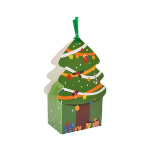 Detail of a green Christmas tree shaped paper gift box with festive patterns and silk ribbon