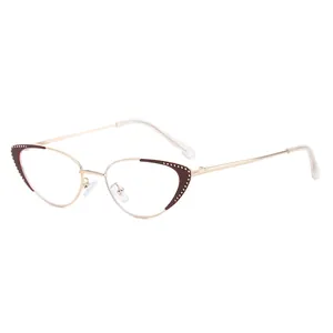 Chic cat eye metal glasses with gold frames and brown rhinestone accents for women
