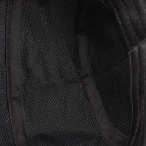 Close-up macro of breathable black honeycomb mesh fabric used for quick-dry sports caps