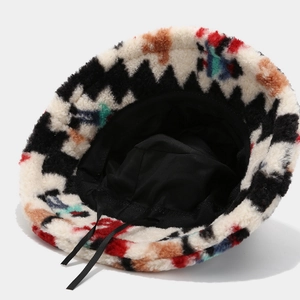 Detail showing plush bucket hat interior with adjustable drawstring and colorful texture