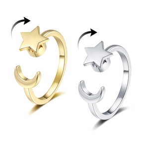 Rotating star and moon anxiety ring in gold and silver finish with adjustable band