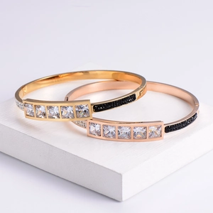 Luxury gold and rose gold metal bracelets with clear zircon and black micro-diamonds