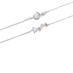 Elegant silver star and moon bracelets featuring moonstone pendants and zircon accents