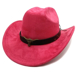 Detailed view of magenta suede cowboy hat with black leather band and metal bull head charm