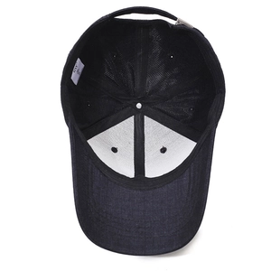 Navy blue baseball cap with internal sweatband, metal buckle and peak mountain design