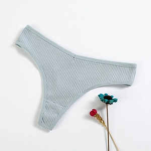 Light blue ribbed cotton thong for women with a minimalist seamless design and soft texture