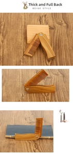 Detail of folding green sandalwood beard comb showing wood grain and metal hinge mechanism