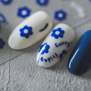 5D embossed nail art stickers with blue flowers and Sunny text on white background