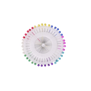 Sewing straight pins with colorful pearl heads arranged in a white circular wheel storage disk