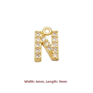 Detailed close-up of 9x6mm gold letter N pendant paved with zircon for DIY jewelry