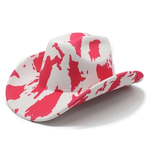 Pink and white cow print western cowboy hat with wide brim and wool-like texture