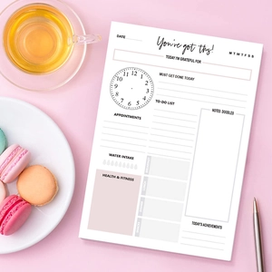 Minimalist daily planner notepad with hourly schedule and fitness tracker for time management