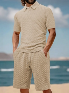 Close-up of the jacquard waffle texture on this breathable beige men's polo set