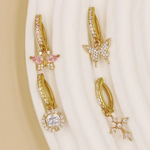 Golden butterfly heart and cross earrings set with pink and white zircon accents