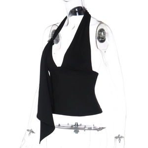 Detail view of black halter top featuring a deep V-neck and decorative metal shoulder ring