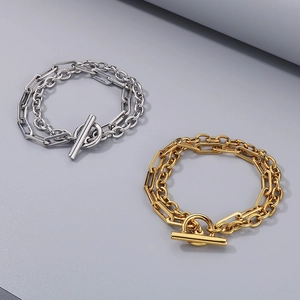 Detail of double-layer stainless steel bracelet with paperclip links and a T-bar clasp
