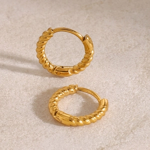 Classic 18k gold braided twist hoop earrings with minimalist geometric hollow design