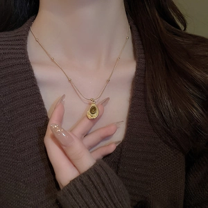 Vintage stainless steel necklace with brown tiger eye stone on gold serpent chain