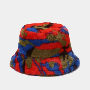 Detail of colorful plush bucket hat featuring red and blue camouflage faux fur texture