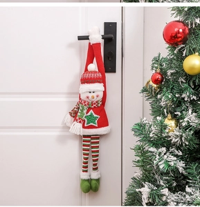Christmas snowman hanger on door handle with festive knit details and striped legs