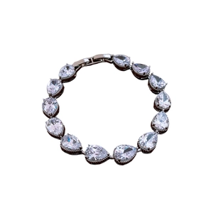 Sparkling silver bracelet with teardrop-shaped zircon stones and secure clasp