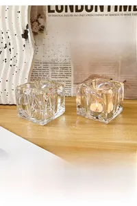 Macro detail of cube crystal glass candle holder with textured wave pattern and tealight