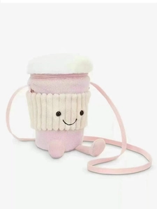Cute pink plush coffee cup crossbody bag with smiling face and foam detail on white background