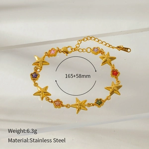 Detail view of 18K gold plated stainless steel bracelet with colorful star zircon pendants