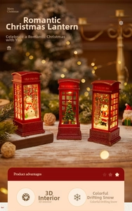Close-up of a red vintage telephone booth Christmas lantern with snow and Santa scene