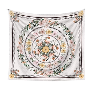 Detail of bohemian tapestry with quilted texture and concentric floral pattern design