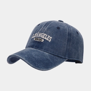Detailed view of Los Angeles 1950 embroidery on washed vintage blue baseball cap