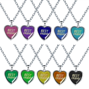 Detail showing various color options for heart locket necklace with Best Friend text