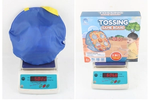 Weight measurement detail showing dinosaur bean bag toss game net weight 502g and gross weight 606g