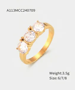 Detail view of 18k gold plated titanium steel ring featuring three set 0.6cm zircons