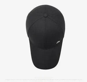 Top-down view of a black 6-panel baseball cap with small silver metallic brim detail