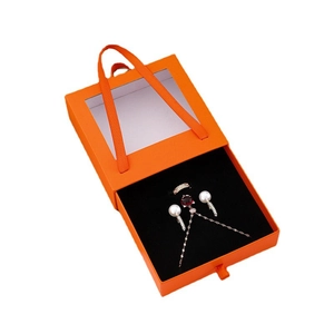 Orange drawer jewelry box with transparent window and black velvet insert display