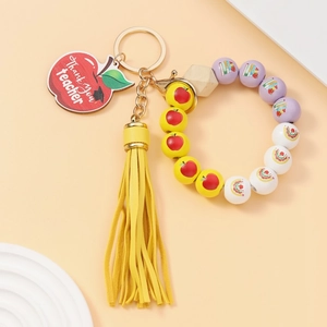 Colorful acrylic bead bracelet keychain with apple wood pendant and yellow tassel